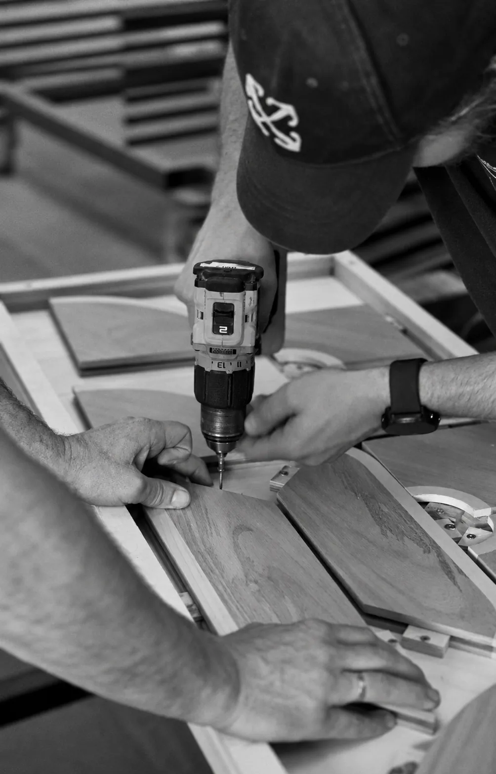 A carpenter fixing the parts of a panel