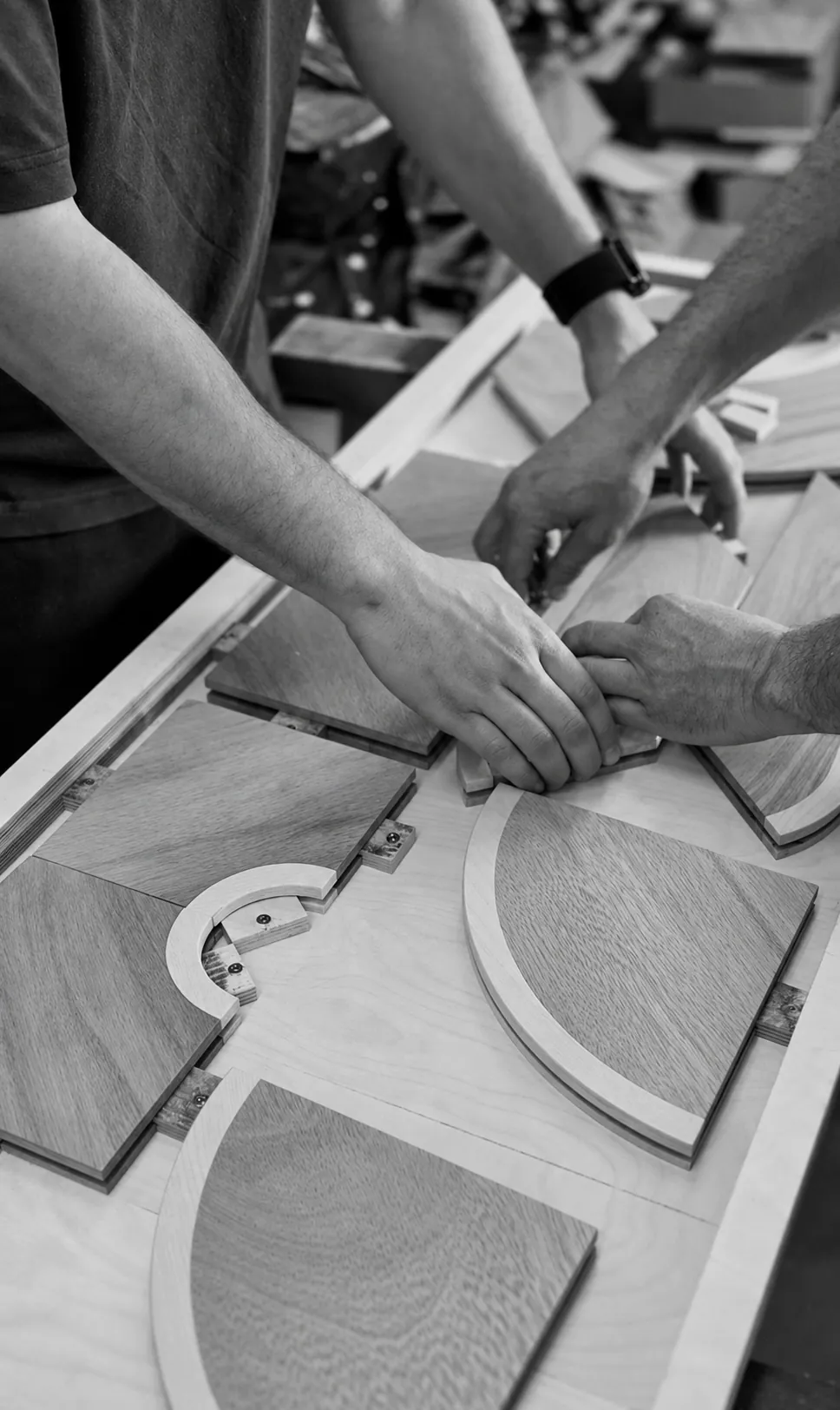 Carpenters laying out the parts of a panel