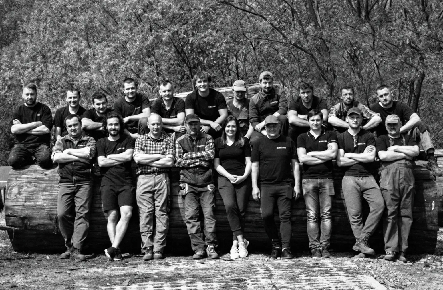 The Duraj's Wood team on a large log