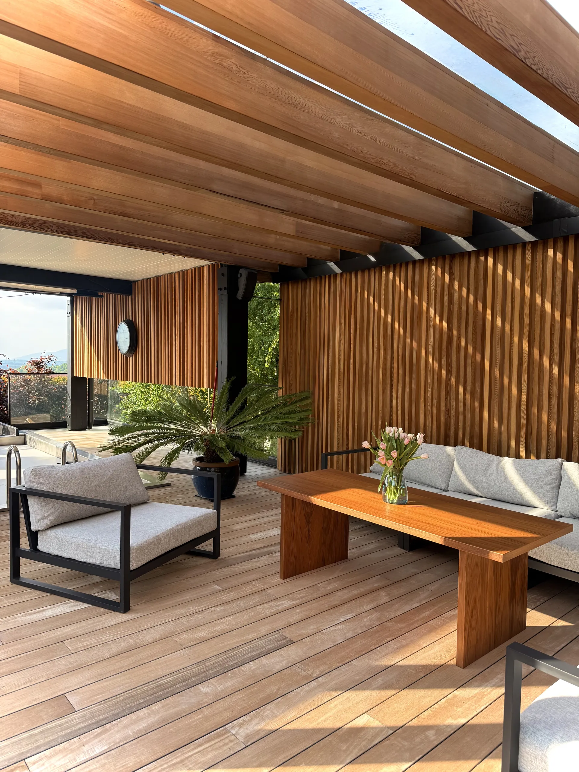 A cedar pergola over a Teak terrace in the Beskidy mountains